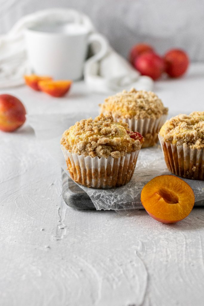 plum crumble muffins with fresh fruit perfect with your morning coffee