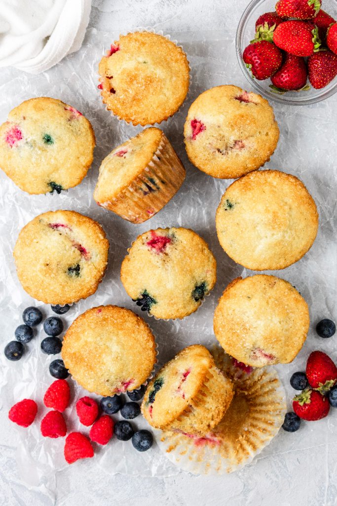 The best homemade triple berry muffins made with strawberries, raspberries, and blueberries