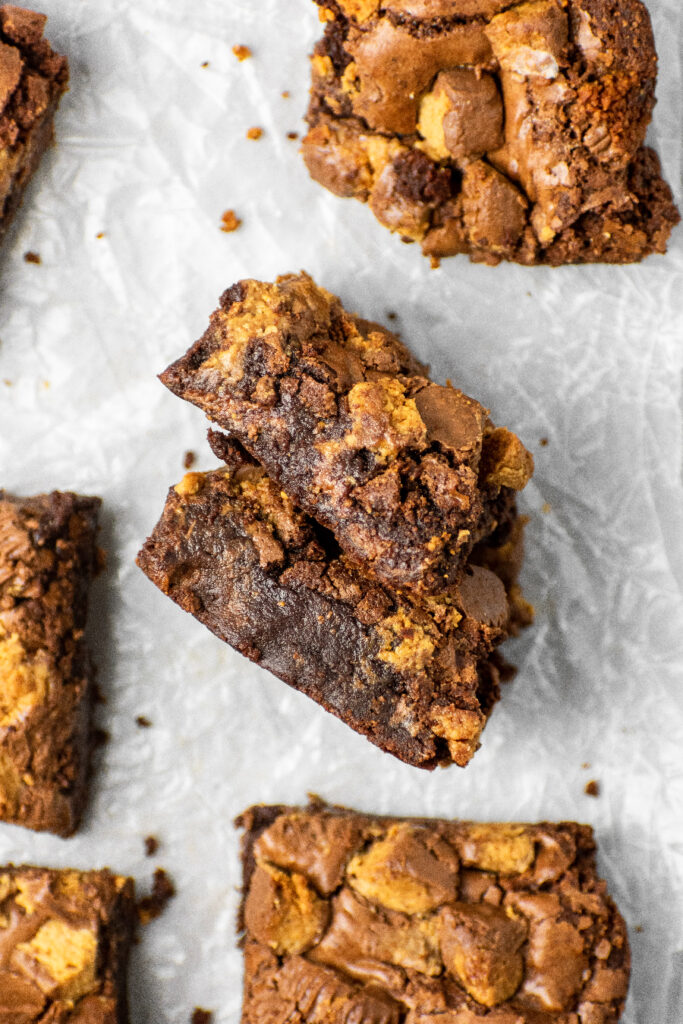 dark chocolate reese's peanut butter cup brownies that are ultra fudgy and ooey gooey