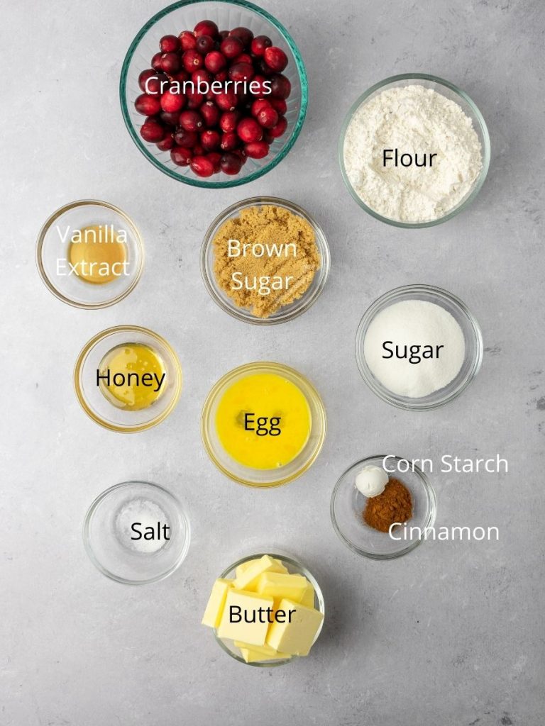 Ingredients needed: cranberries, flour, vanilla extract, brown sugar, sugar, honey, egg, corn starch, cinnamon, salt, and butter.