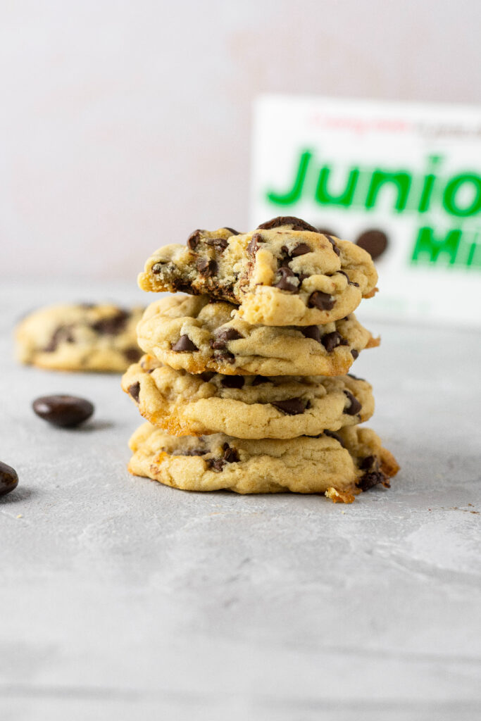 mint chocolate chip cookies with junior mints stacked on top of each other