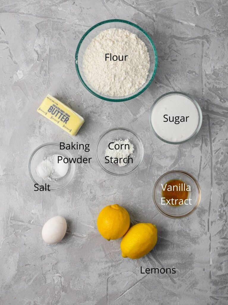 Ingredients: flour, butter, sugar, corn starch, baking powder, salt, egg, vanilla extract, and lemons.