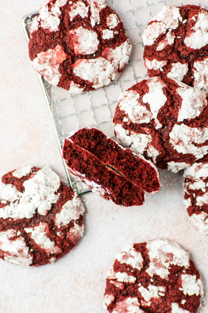 red velvet cookies with powdered sugar crinkles.