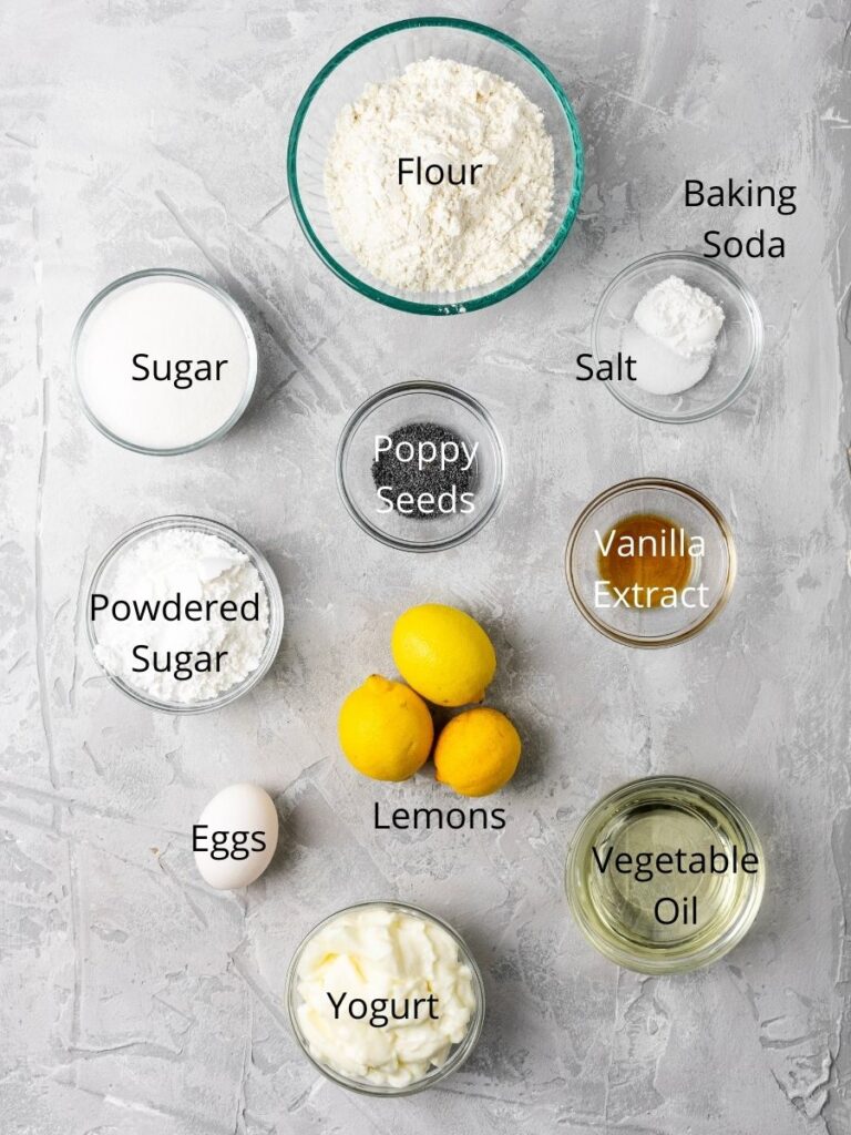Ingredients needed: flour, baking soda, salt, sugar, poppy seeds, vanilla extract, powdered sugar, lemons, eggs, vegetable oil, and yogurt.