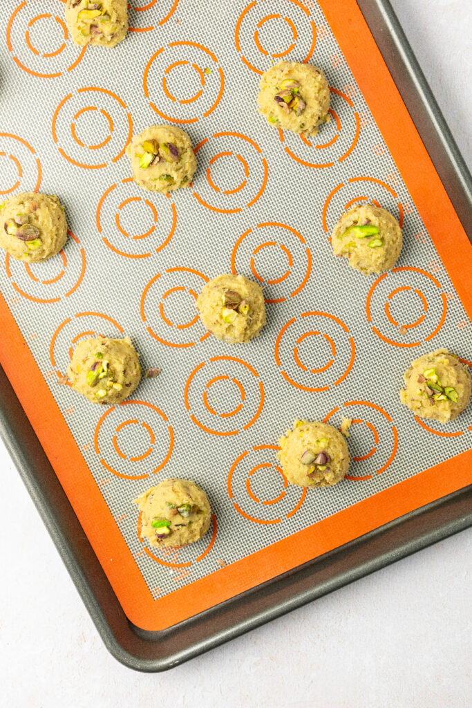 Drop-style cookie dough on a baking sheet.