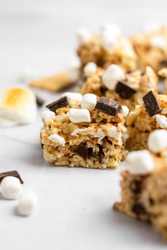 Homemade rice krispie treats with plenty of mini marshmallows and chocolate pieces.