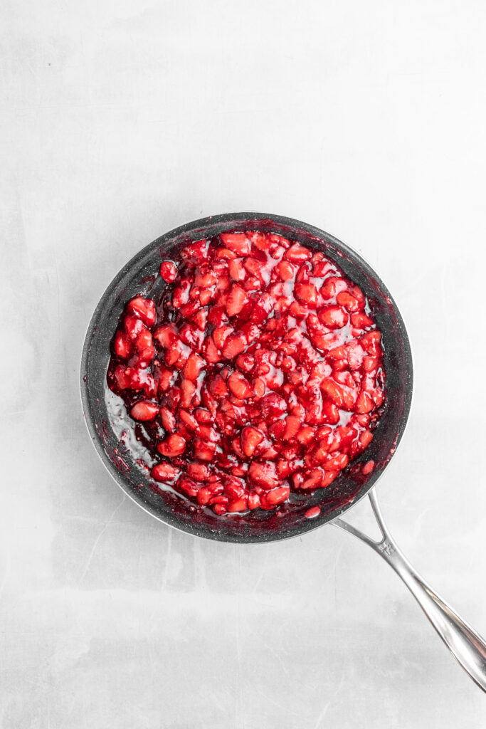 Strawberry jam in a medium-sized saucepan.