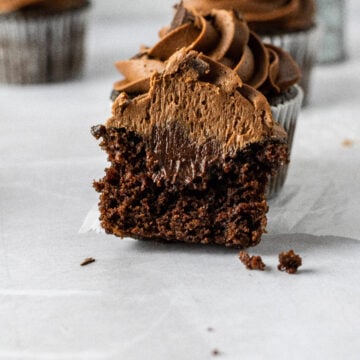 Triple chocolate cupcakes with a dark chocolate ganache filling and chocolate frosting.