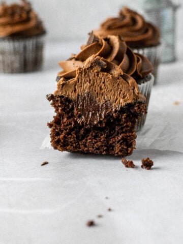Triple chocolate cupcakes with a dark chocolate ganache filling and chocolate frosting.