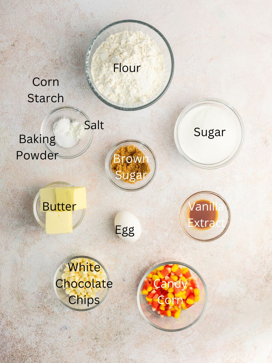 Ingredients needed: flour, sugar, brown sugar, corn starch, salt, baking powder, butter, egg, vanilla, white chocolate, and candy corn.