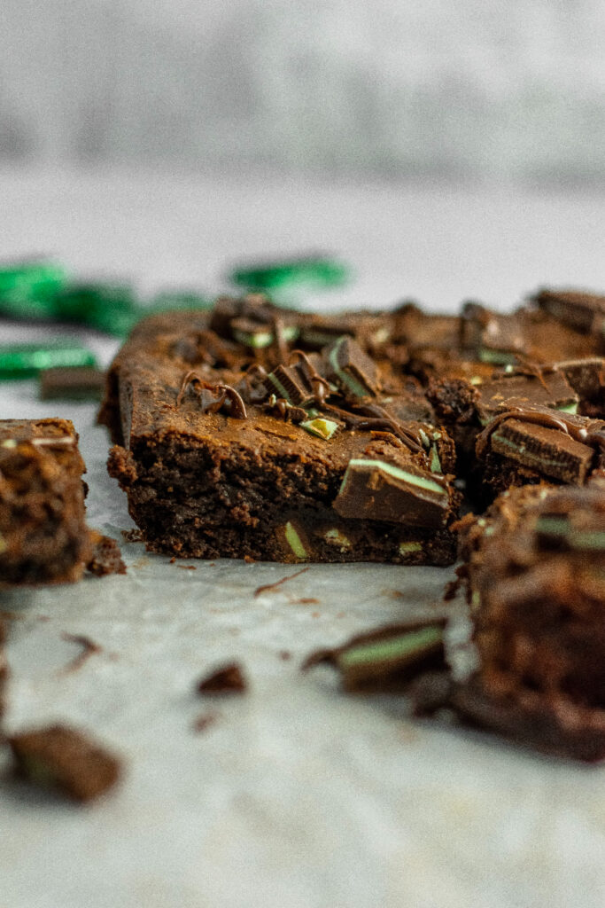 Andes mint brownies with extra candy pieces on top.