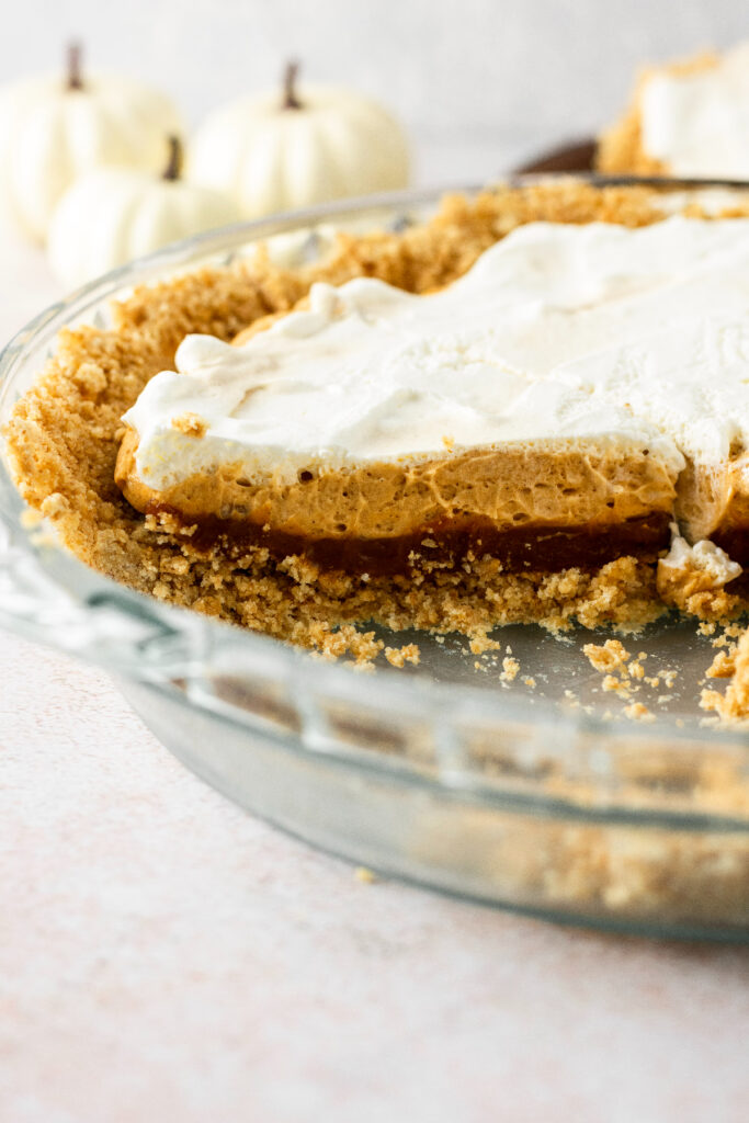 No bake pumpkin pie with graham cracker crust and three layers of creamy filling.