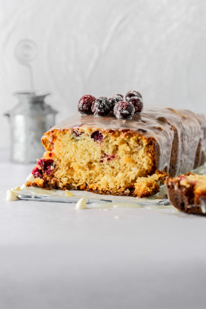White chocolate cranberry bread with sugar coated cranberries on top.