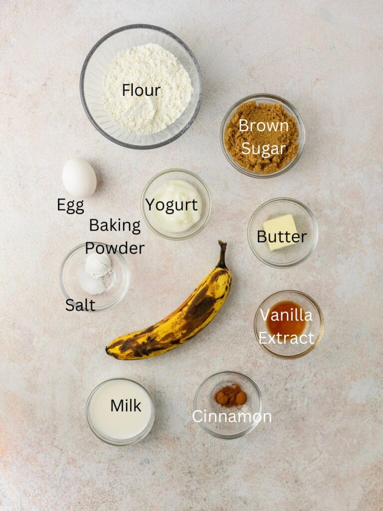 Ingredients needed: flour, brown sugar, egg, yogurt, baking powder, butter, salt, banana, milk, cinnamon, and vanilla.