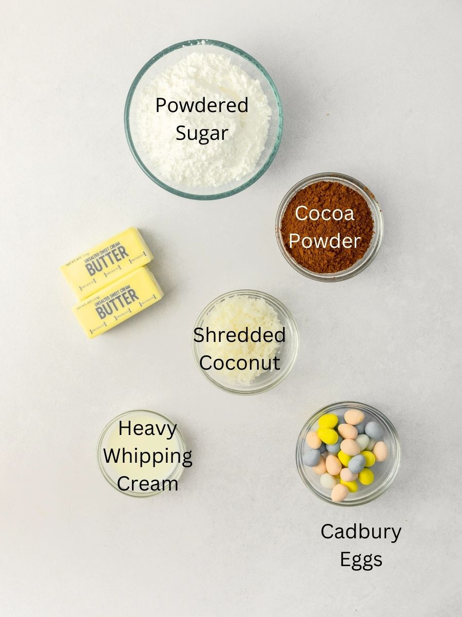 Ingredients: powdered sugar, butter, coconut, heavy cream, cadbury eggs, and cocoa powder.