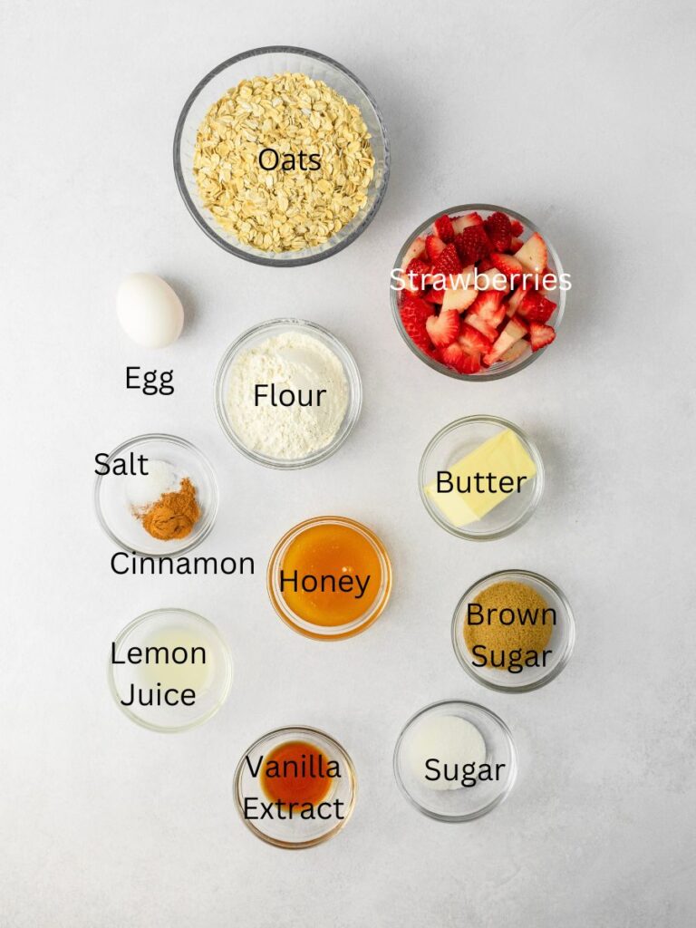 Ingredients: Oats, strawberries, egg, flour, butter, salt, cinnamon, honey, lemon juice, vanilla, sugar, and brown sugar.