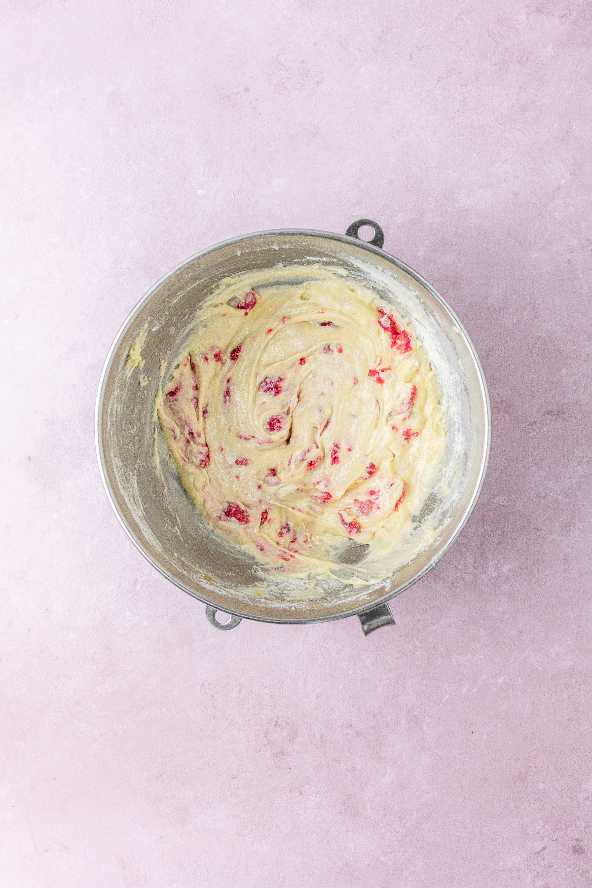 Raspberry cupcake batter in a large bowl.