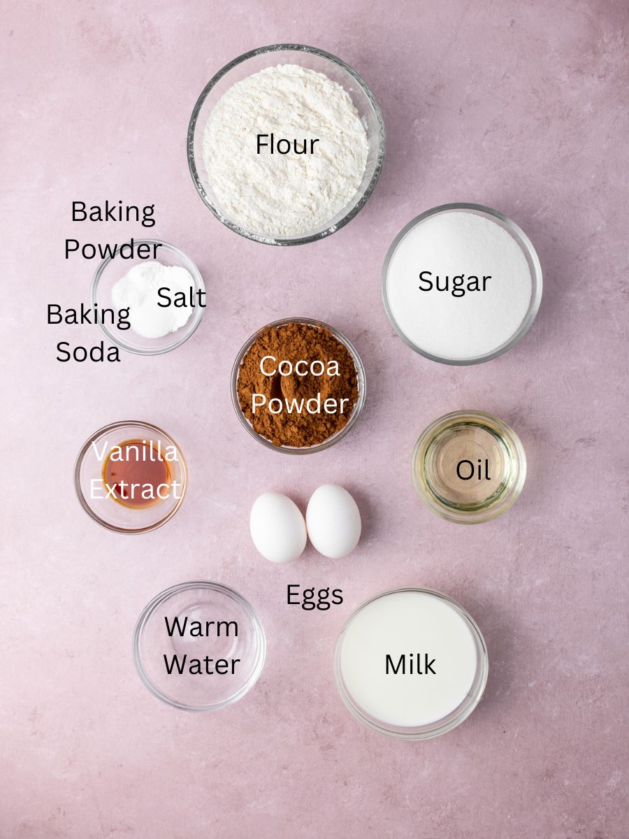 Ingredients: flour, sugar, cocoa powder, baking powder, baking soda, salt, vanilla, eggs, water, milk, and oil.