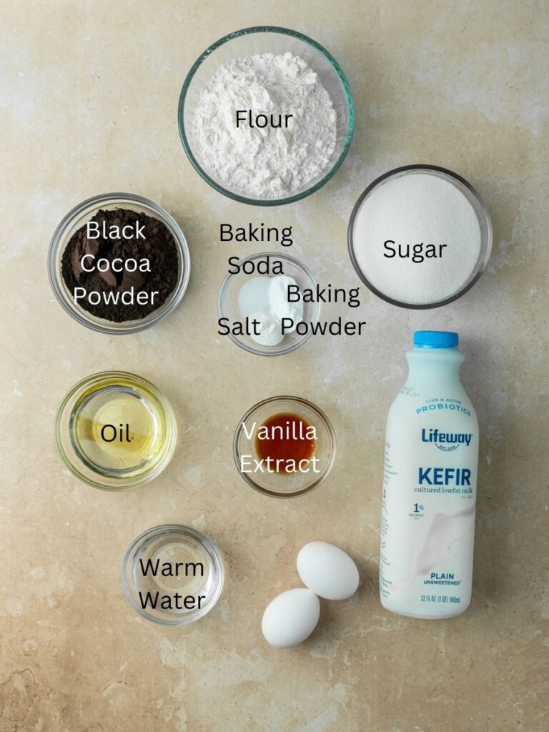 Ingredients: flour, black cocoa powder, sugar, baking soda, baking powder, salt, oil, vanilla, water, eggs, and kefir milk.