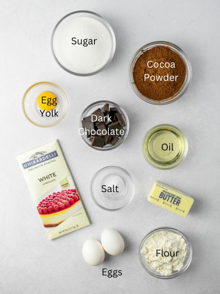 Ingredients: sugar, cocoa powder, egg yolk, dark chocolate, oil, white chocolate, salt, butter, eggs, and flour.