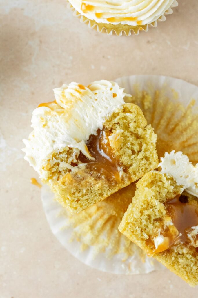Caramel filled brown sugar cupcakes with homemade caramel sauce and frosting.