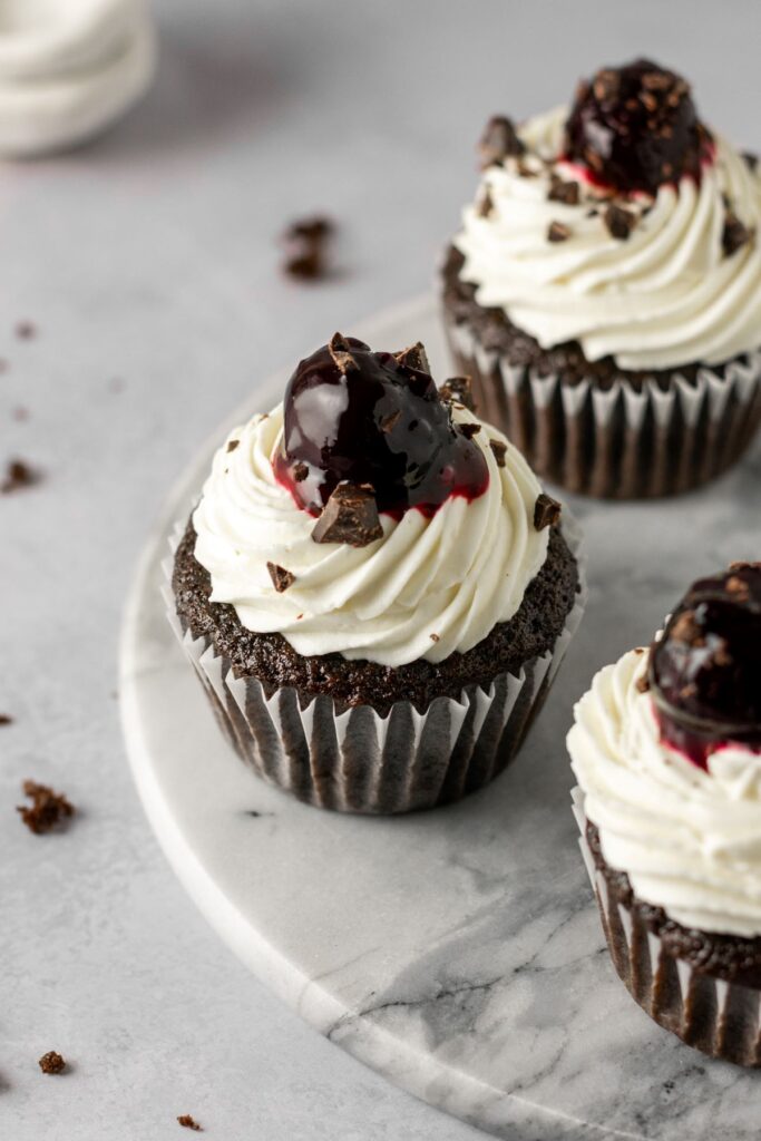 Easy black forest cupcakes with chocolate shavings.