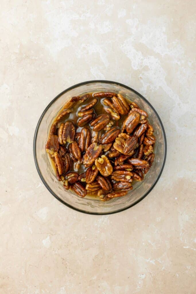 Pecan pie mixture in a small bowl.