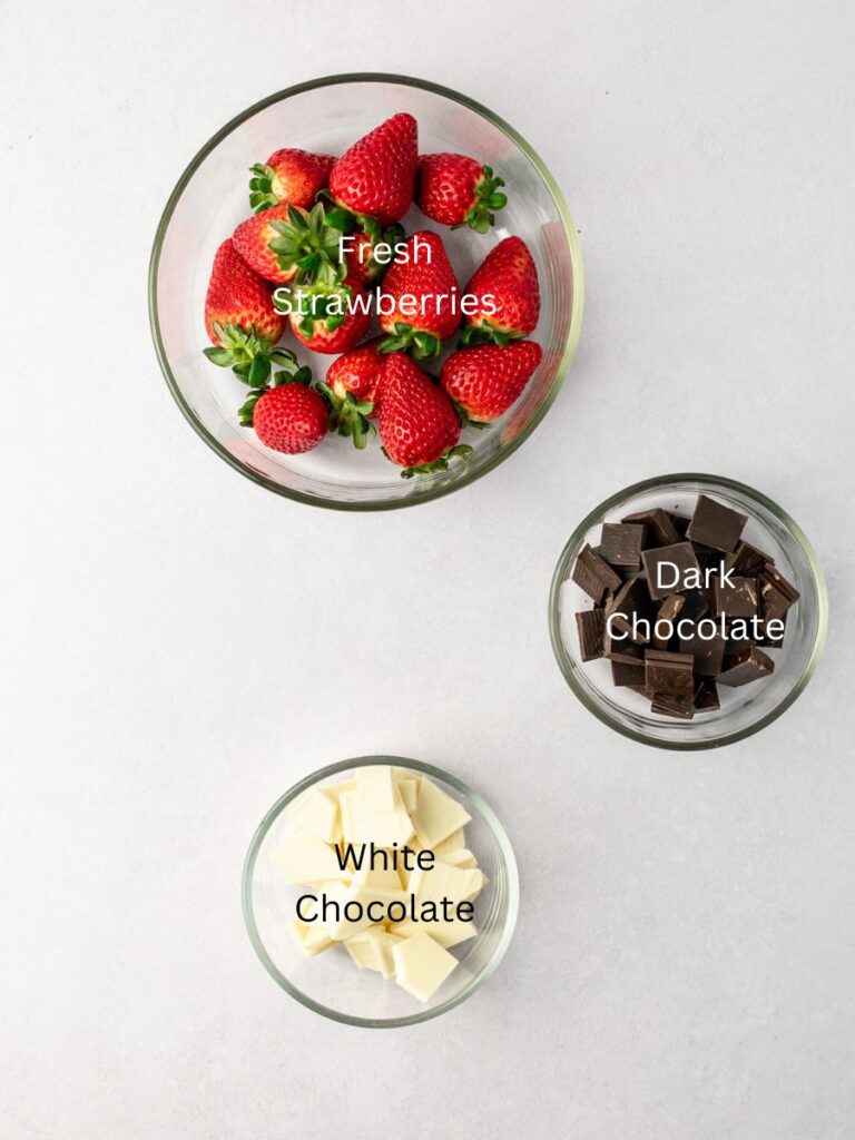 Ingredients needed: fresh strawberries, dark chocolate, and white chocolate.