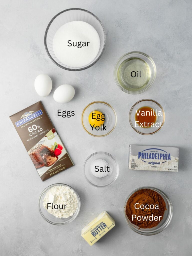 Ingredients needed: sugar, oil, eggs, egg yolk, vanilla, chocolate, salt, flour, cream cheese, cocoa powder, and butter.