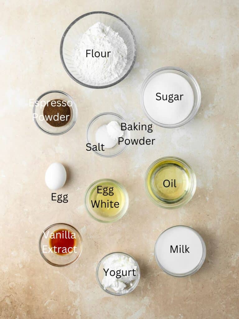 Ingredients needed: flour, sugar, espresso powder, salt, baking powder, oil, egg white, egg, vanilla, milk, and yogurt.