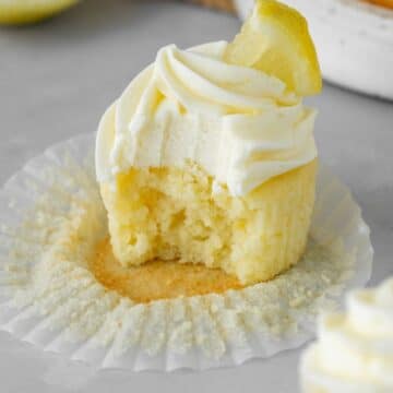 The best moist lemon cupcakes with lemon cream cheese frosting on top.