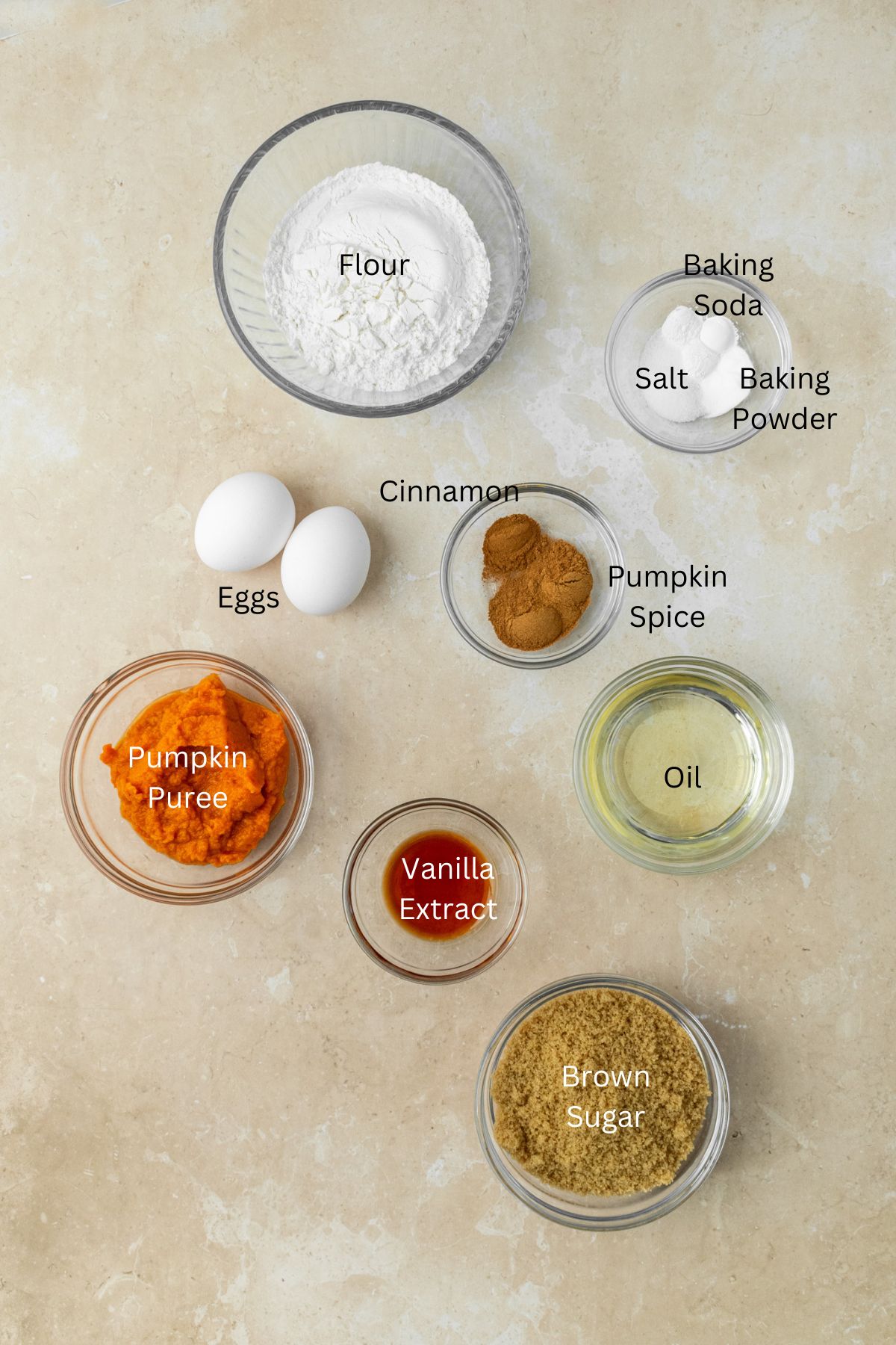 Ingredients: flour, baking soda, baking powder, salt, pumpkin, spices, sugar, vanilla, eggs, and oil.