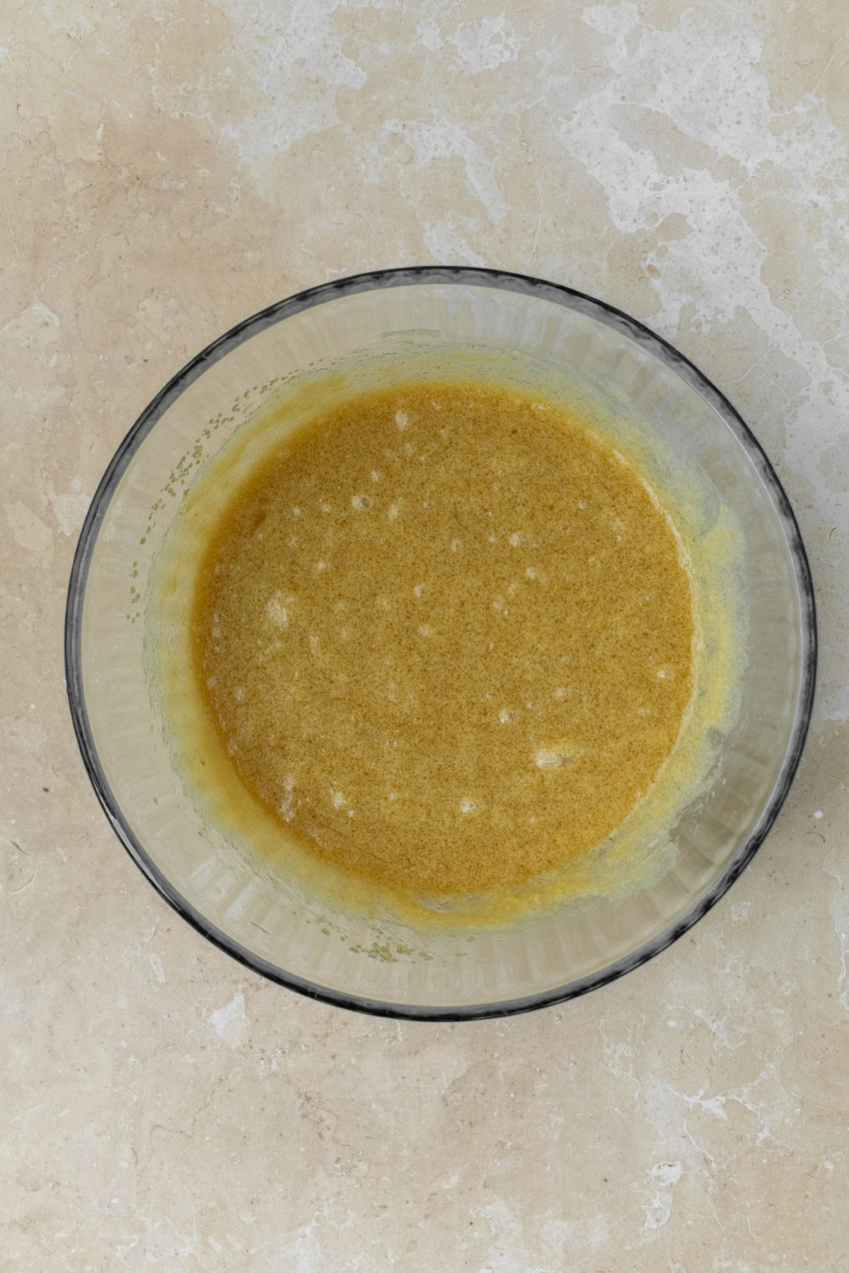 Wet ingredients mixed together in a large bowl.
