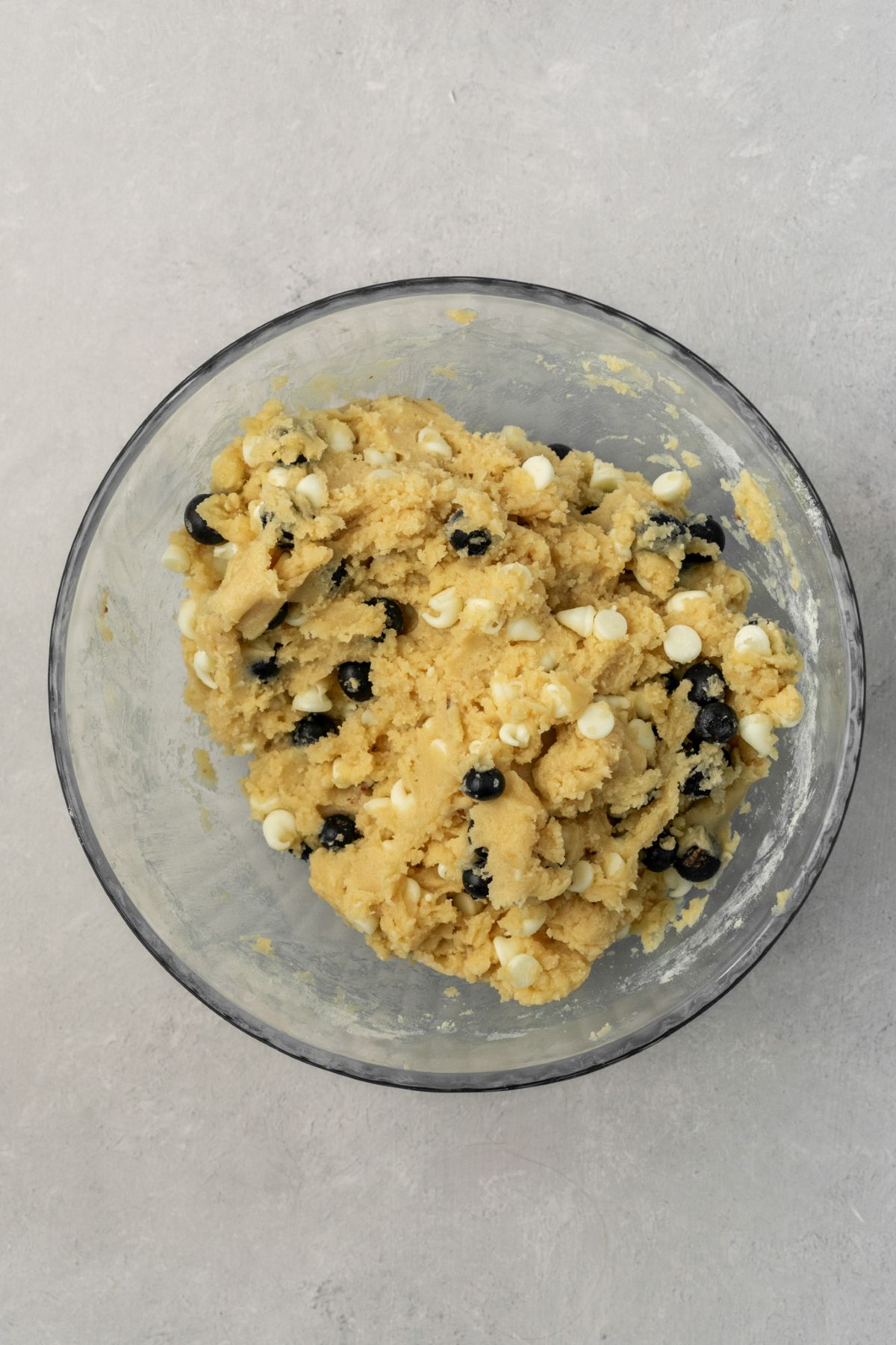 Blueberry white chocolate cookie dough in a large bowl.
