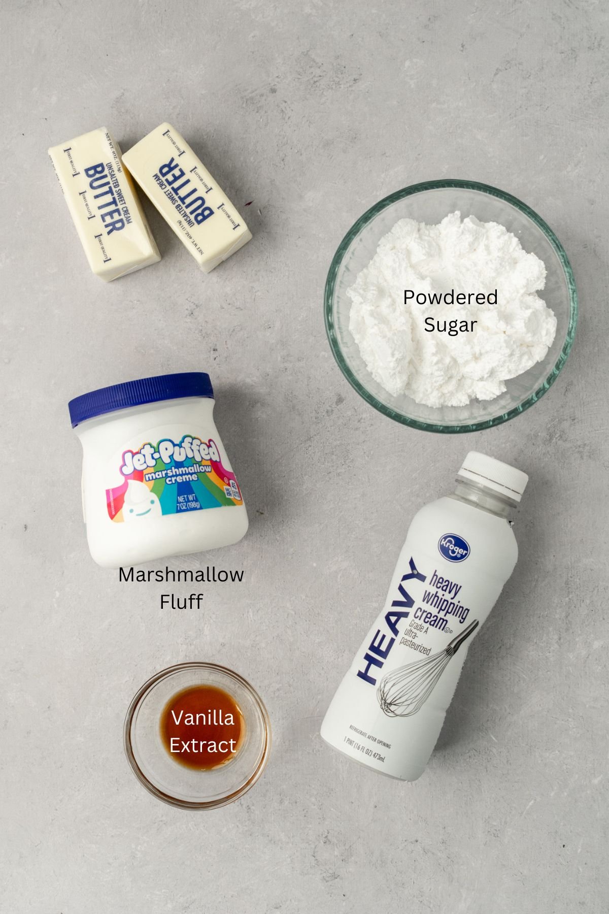 Ingredients for marshmallow frosting: butter, marshmallow fluff, powdered sugar, heavy cream, and vanilla.