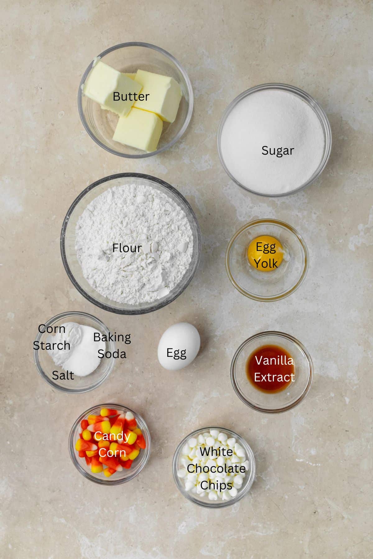 Ingredients: butter, sugar, eggs, flour, baking soda, corn starch, salt, vanilla, candy corn, and white chocolate.