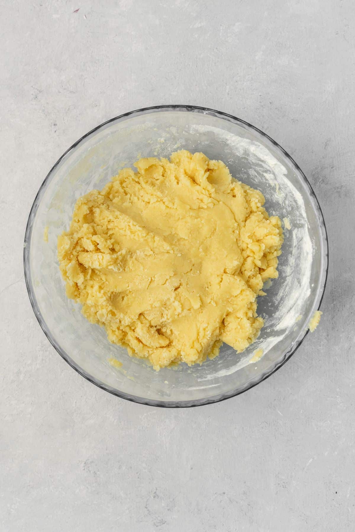 Sugar cookie dough in a large bowl.