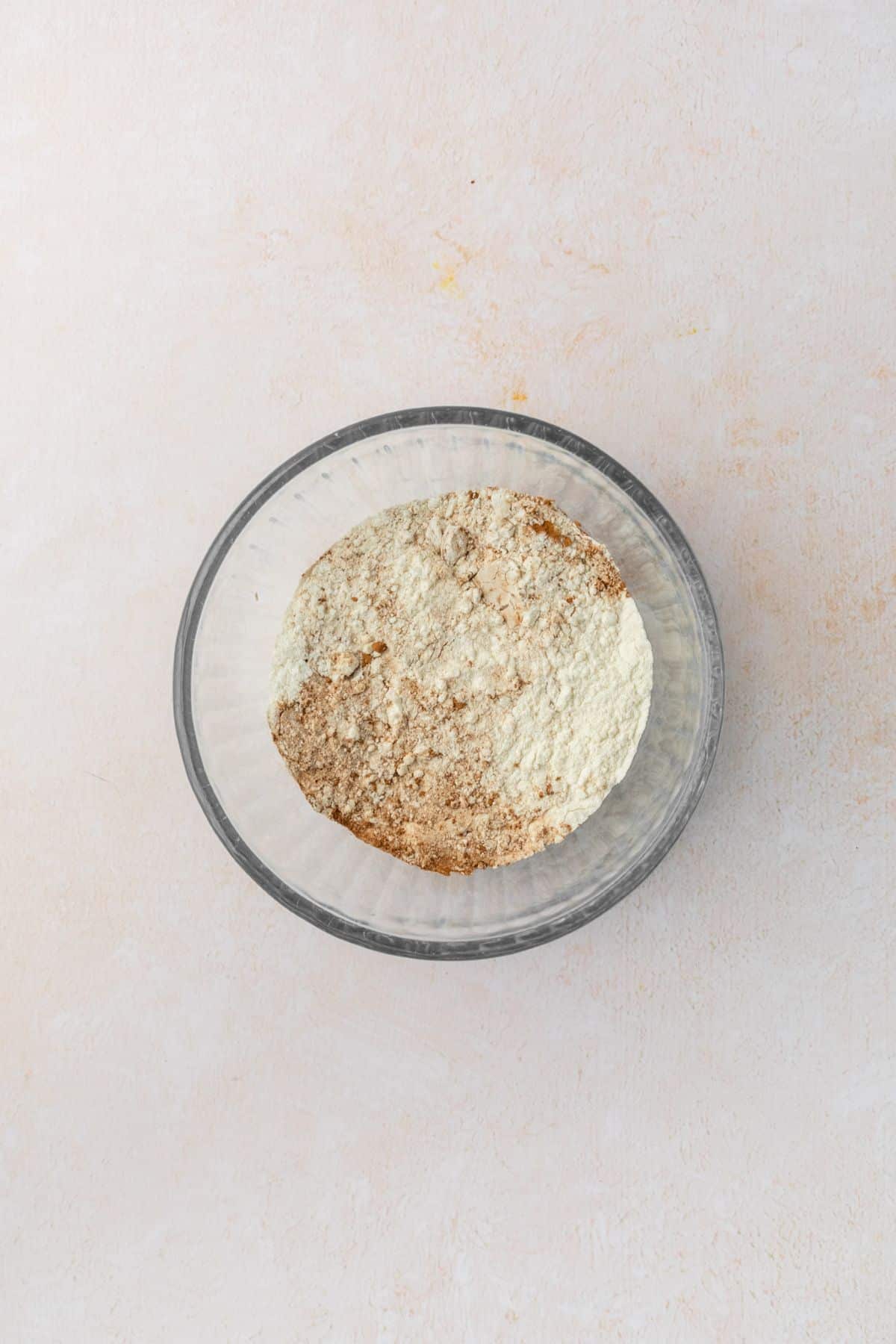 Dry ingredients in a glass bowl for cupcakes.