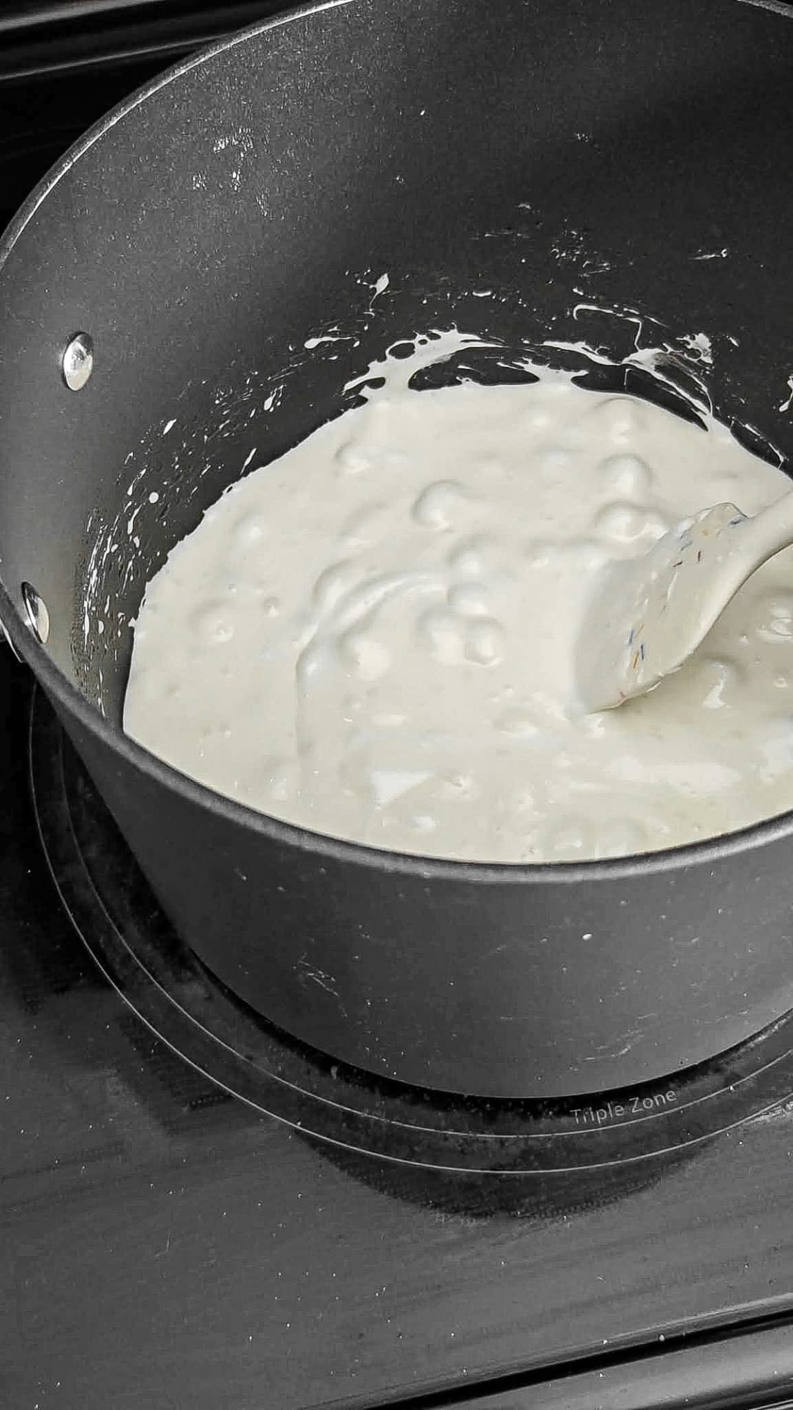 Melted marshmallows in a large saucepan.
