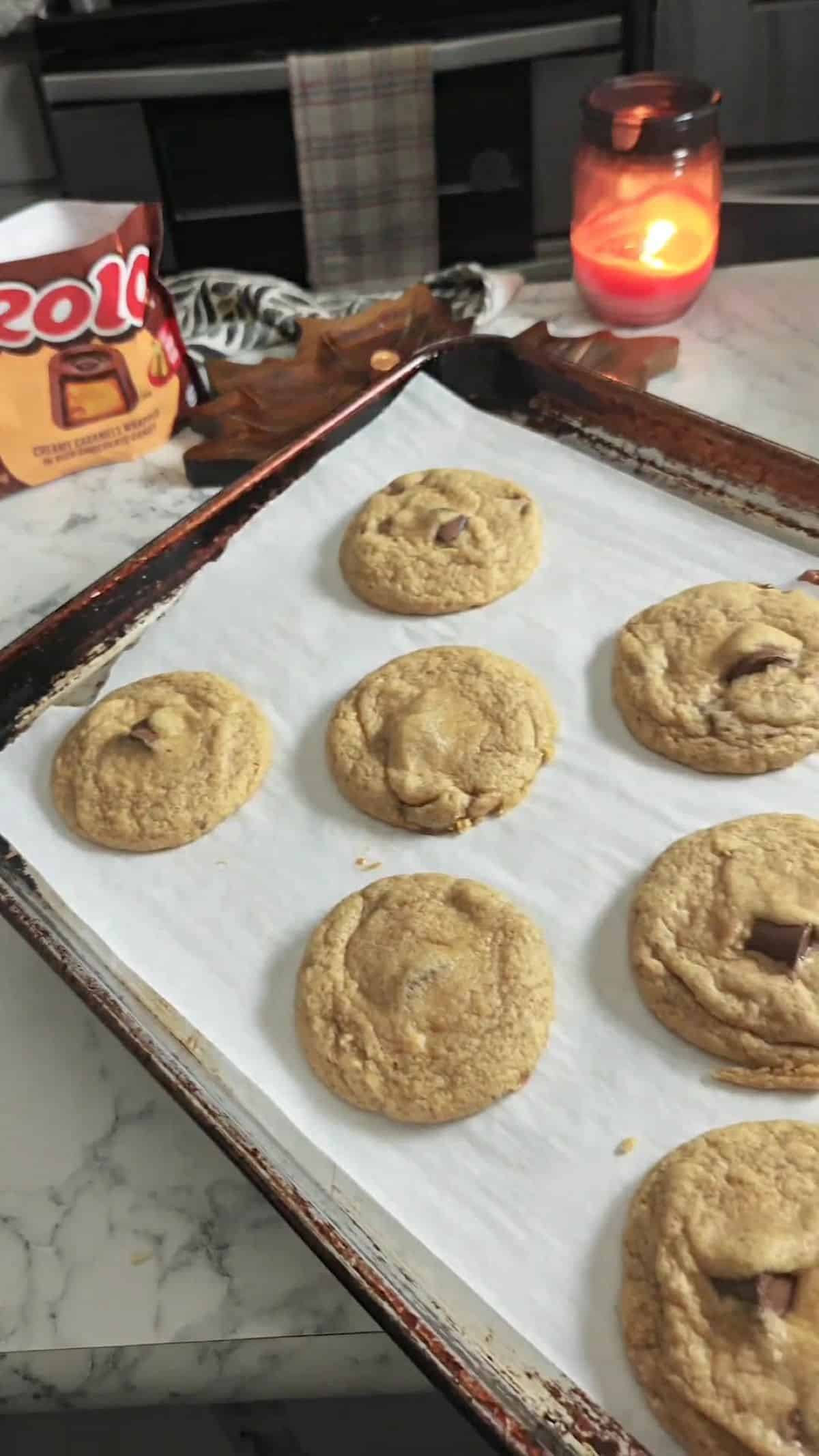 Freshly baked rolo cookies on a baking sheet.