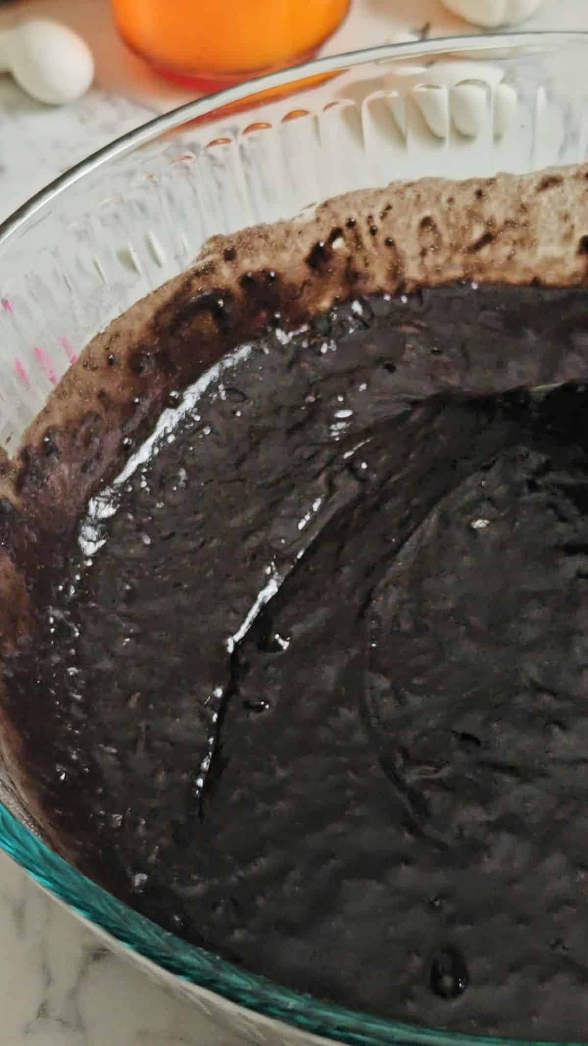 Black velvet cake batter in a bowl.